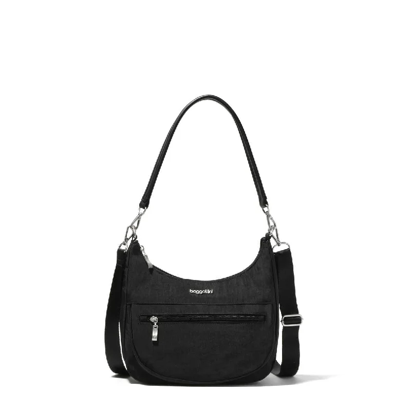 Charging station travel adapters with multiple USB ports for powering devices on the goBaggallini Modern Pocket Half Moon Bag MHM800