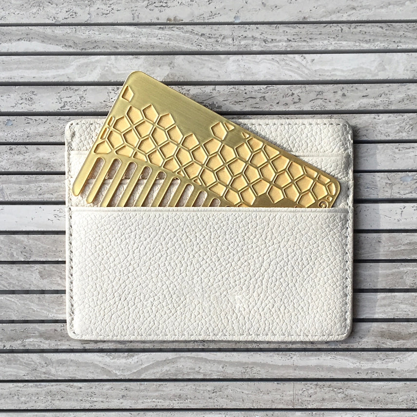 Anti - theft RFID blocking travel wallet for safe money and card storageBrass Tile Go-Comb | Metal Wallet-Sized Comb- $16