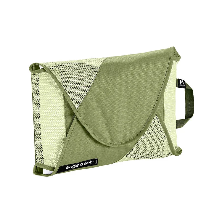 Compression packing bags to save space in travel backpacksEagle Creek Garment Folder