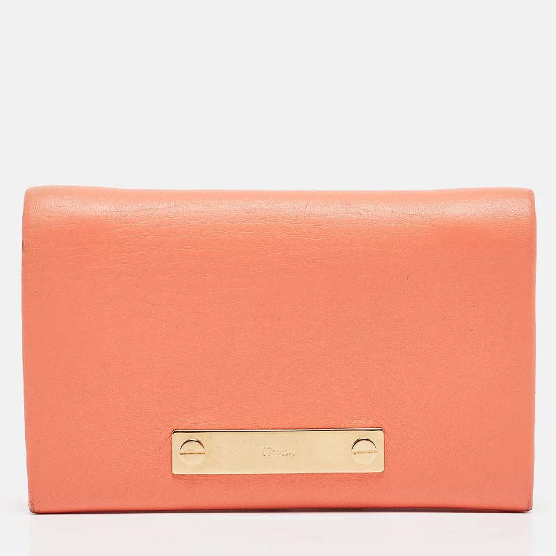 Money clips vs traditional walletsChloe Orange Leather Fold Over Flap Wallet