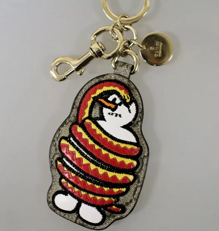 Vintage-style money clips for collectorsNew GUCCI UNICEF GG Canvas/Leather Key Ring/Charm Snowman and Snake