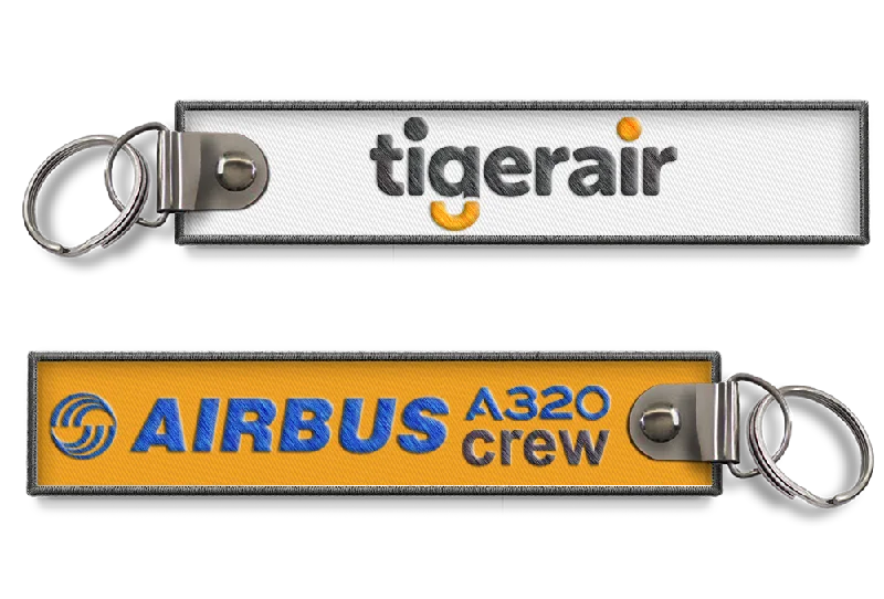 Animal-Print Passport Covers & Wallets for Trendy FashionistasTiger Airways Crew keychain Animal-Print Passport Covers & Wallets for Trendy FashionistasTiger Airways Crew keychain